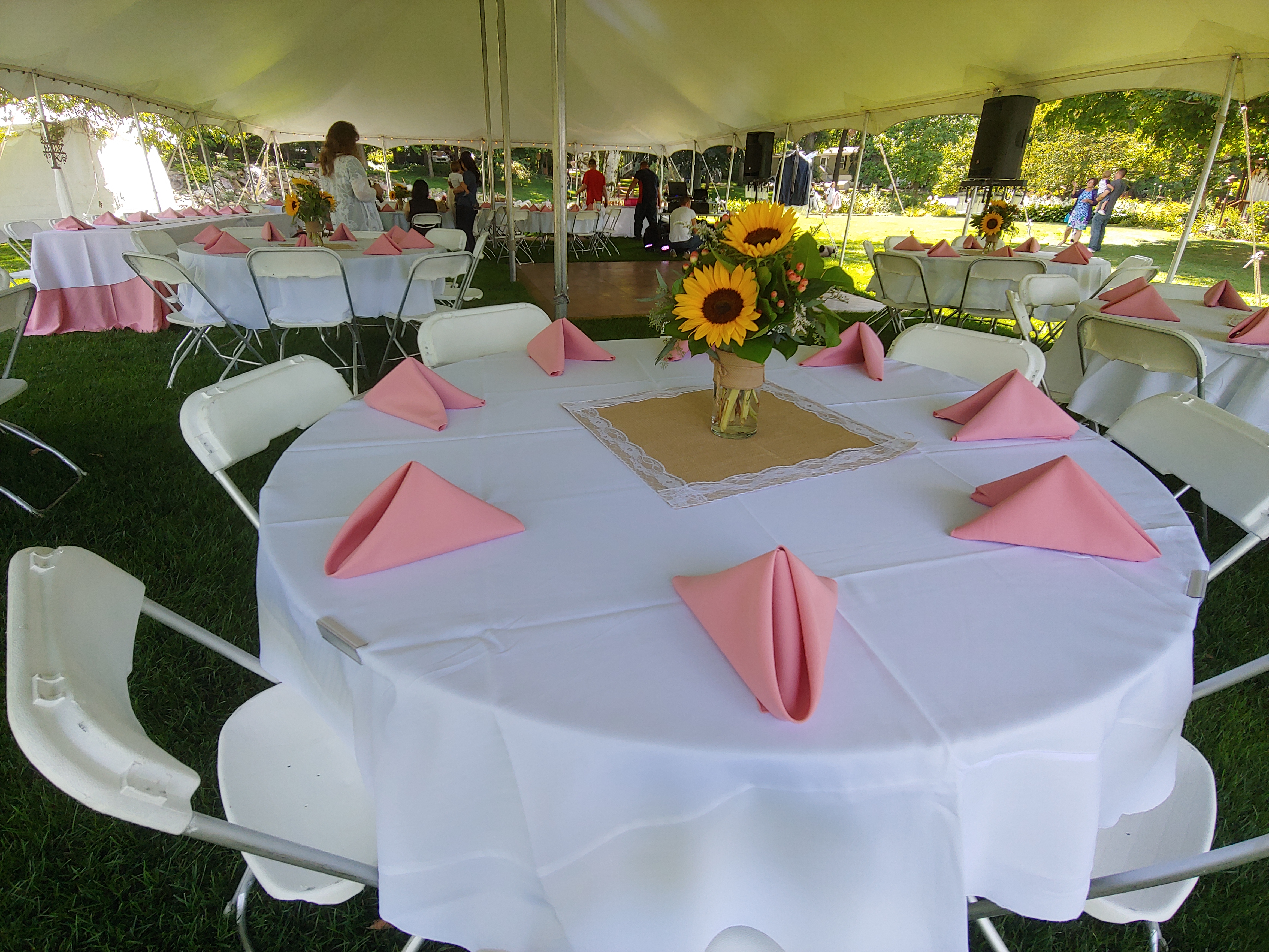 Venue photo -- tent with lakeside backdrop